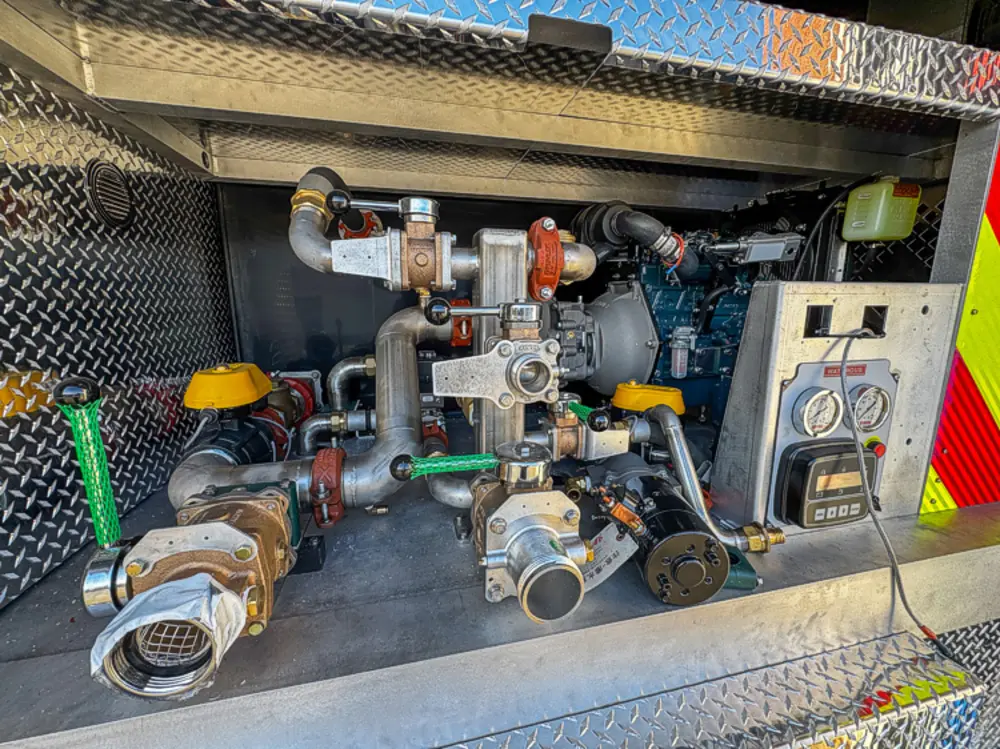 Apparatus in production bay with hood open, photo 81 of 303.
